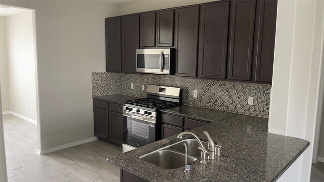 Building Photo - 8814 Alpine Wood Wy