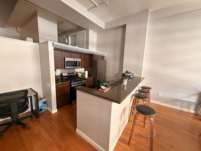 Building Photo - Industrial-Chic Loft in East Village | 1,049 Sq Ft | Gym & Rooftop