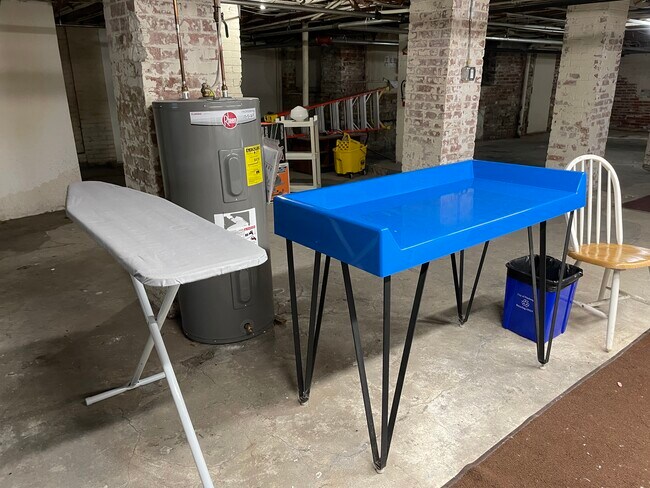 Folding table & ironing board - 5523 Ellsworth Ave