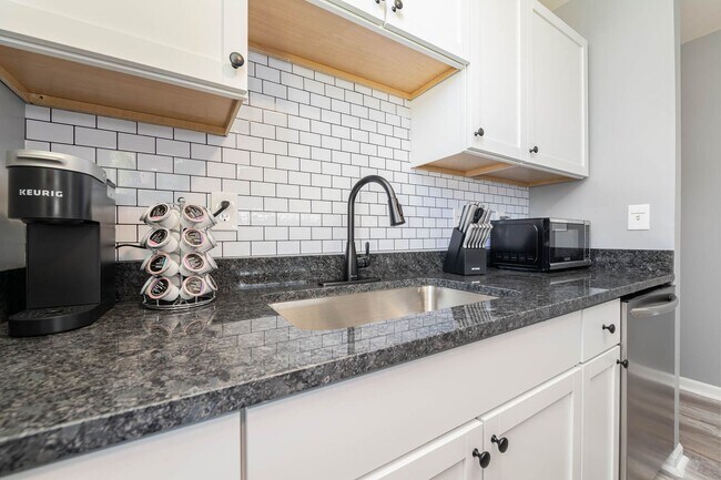 Building Photo - Funky Firehouse Renovated into Modern 2 BD...