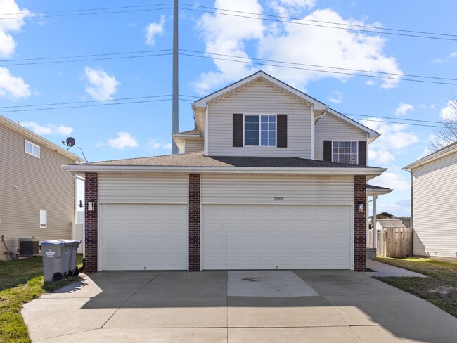 Primary Photo - Renter's Dream with Triple Car Garage