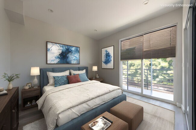 Building Photo - Designer-inspired, tri-level townhome offe...
