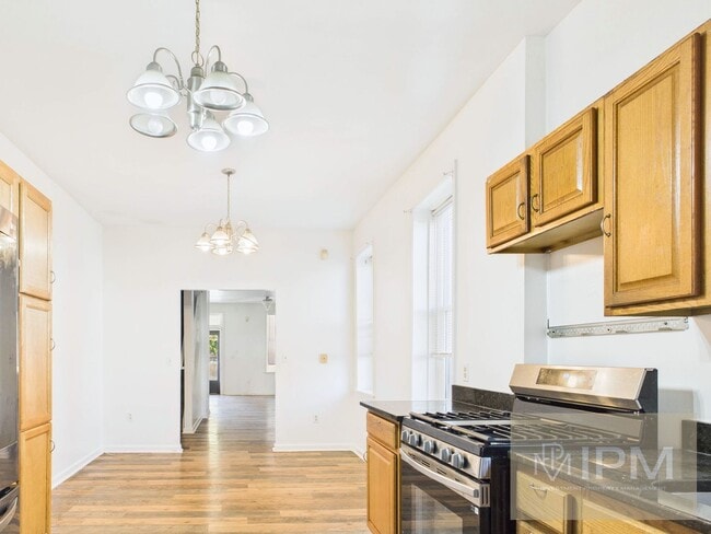 Building Photo - 1/2 OFF First Months Rent! Spacious 3 Bedr...