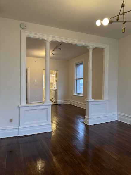 Entry with high ceilings, refinished wood floors and plenty of light! - 118 Philip St