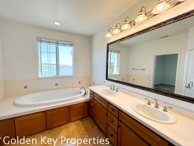 Building Photo - Beautiful Tri-Level Condo in The Bluffs at Carlsbad with Lagoon Views!!