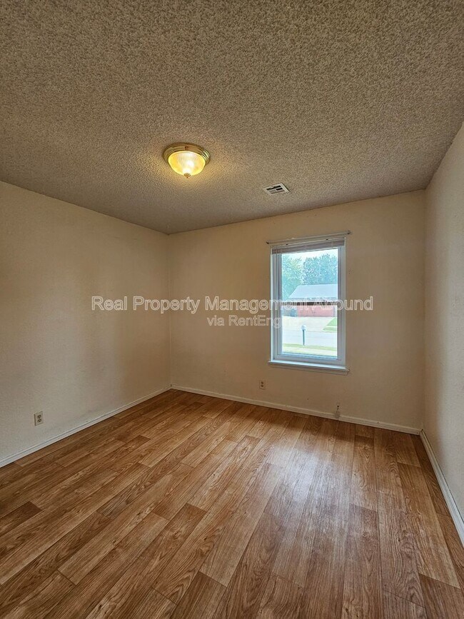 Building Photo - 7710 N 120th Ave E