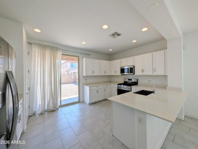 Building Photo - 9509 W Sells Dr