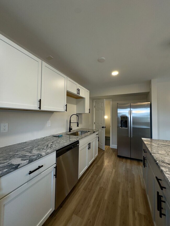 Building Photo - Spacious 3Bed/2Bath Townhome with Modern Amenities and Outdoor Space in Woodlawn MD