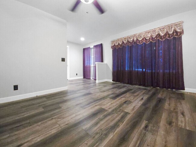 Building Photo - Spacious 4-Bedroom Home with Modern Updates & Expansive Yard