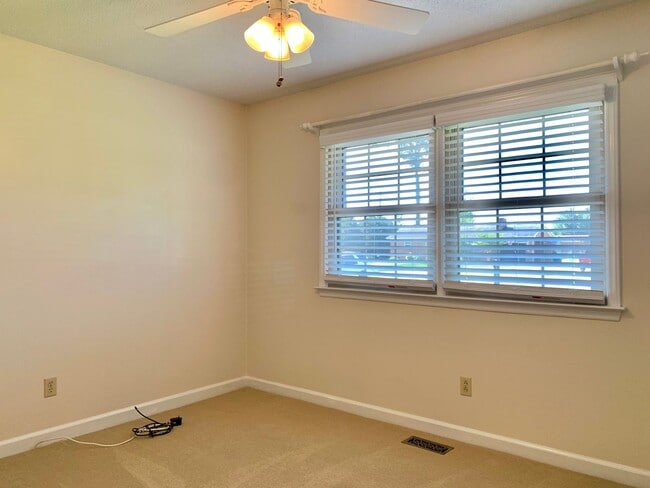 Building Photo - Charming Updated Home, Quiet Street Near Base, Fenced Yard!