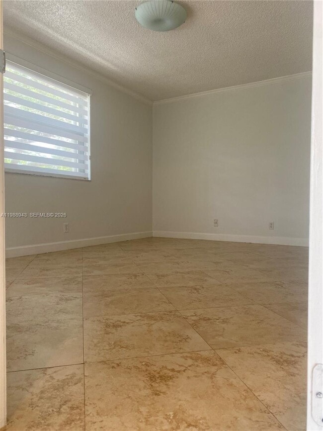 Building Photo - 10121 W Sunrise Blvd