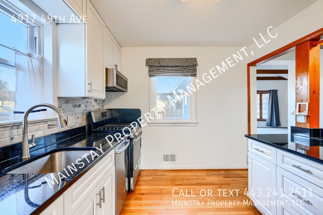 Building Photo - 4917 49th Ave