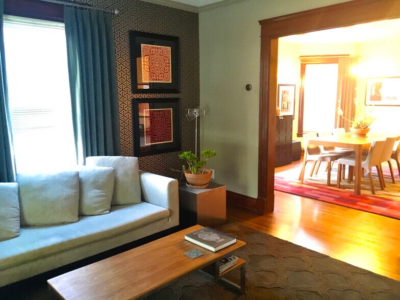 Living Room with custom window coverings - 565 Delta Avenue