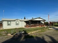 Building Photo - 4 Bed / 2 Bath Country Home – Solar + Move-In Ready