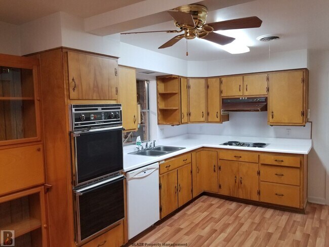 Building Photo - Massive Corner-Lot Home with Retro Charm & Shady Backyard!