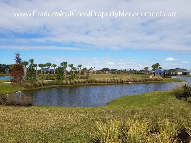 Building Photo - OUTSTANDING 3 BEDROOM/2 BATH IN EAVE'S BEND/ARTISAN LAKES PALMETTO! SEMI FANCED YARD!