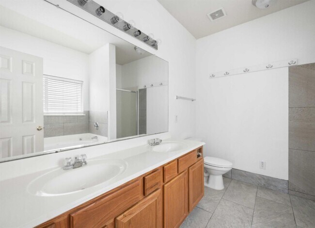 Building Photo - 20827 Settlers Lake Cir N