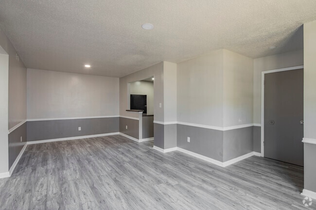 2BR, 1BA - 971SF - Living Room - Academy Apartments