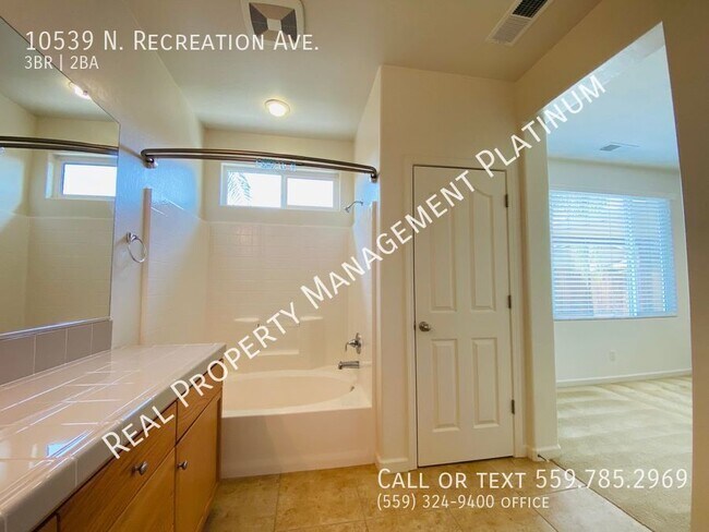 Building Photo - 10539 N Recreation Ave