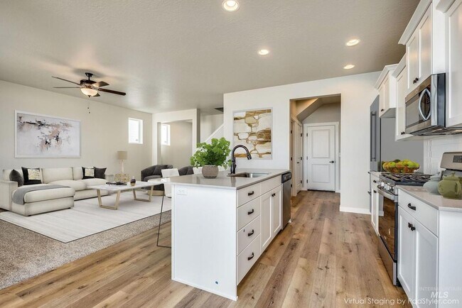 Building Photo - 4 bedroom, 2.5 Bath is a Must See! 1962 SqFt, Beautiful Parks, No Landscaping, and More!