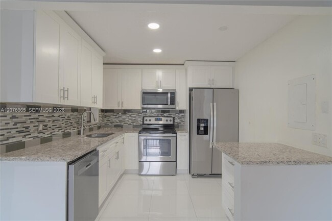 Building Photo - 3745 Cocoplum Cir