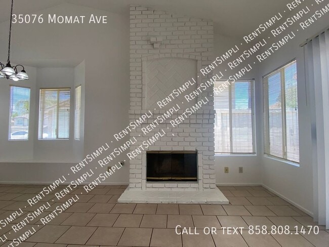 Building Photo - 35076 Momat Ave