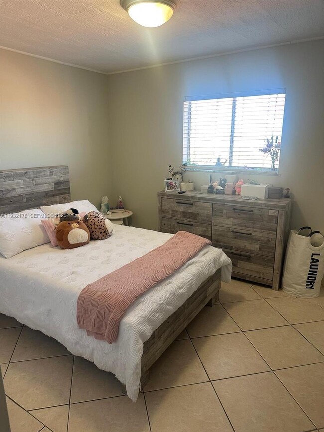 Building Photo - 6091 W 22nd Ct