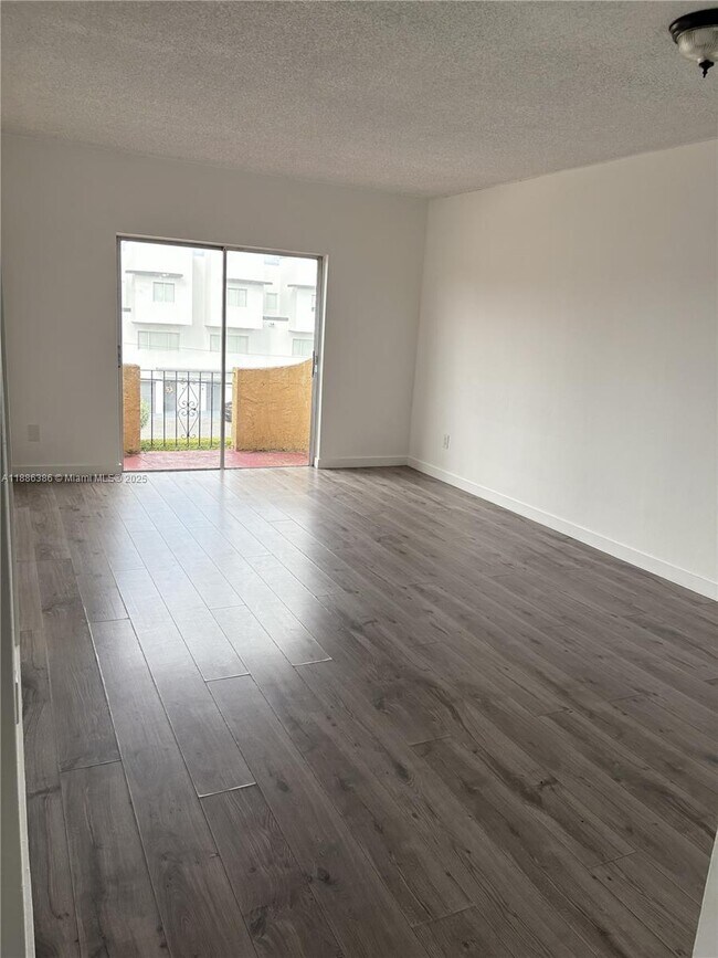 Building Photo - 3675 W 11th Ave