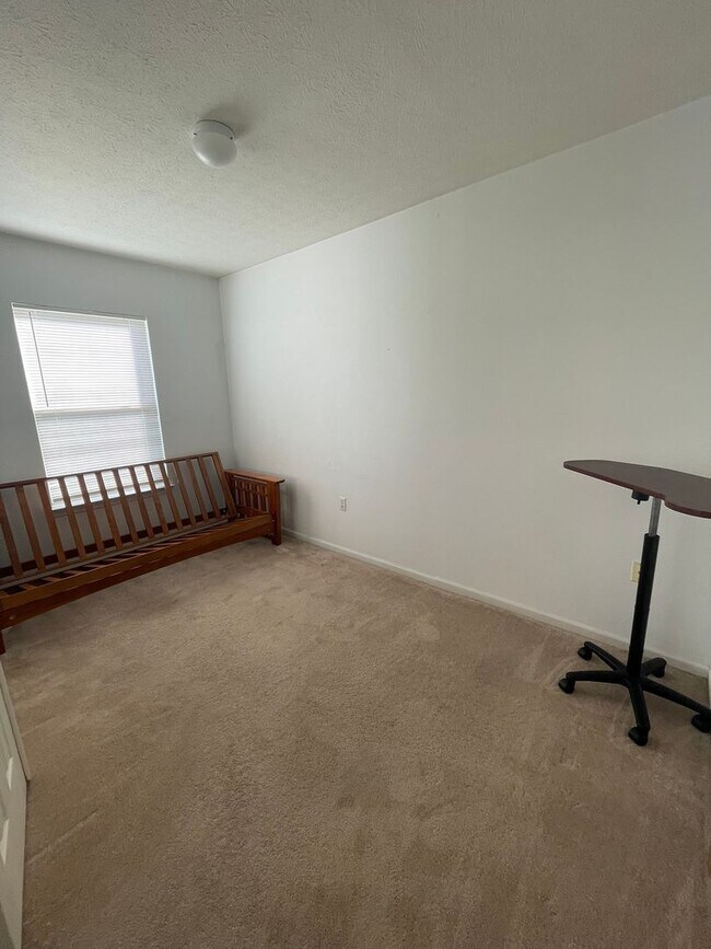 Building Photo - 2 Bed + Office Condo | Pool, Garage & Flexible Move-In