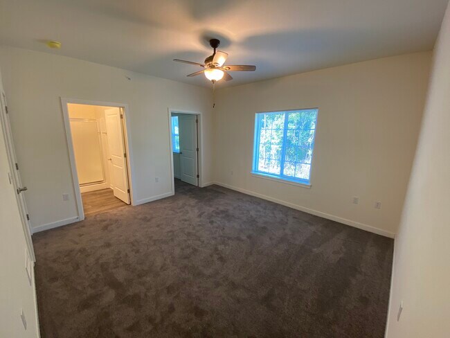 Master bedroom with full bathroom & walk in closet - Trail View Village Apartments