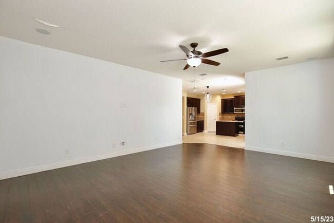 Building Photo - Gorgeous 4/3.5 Home with a Large Fenced Ba...