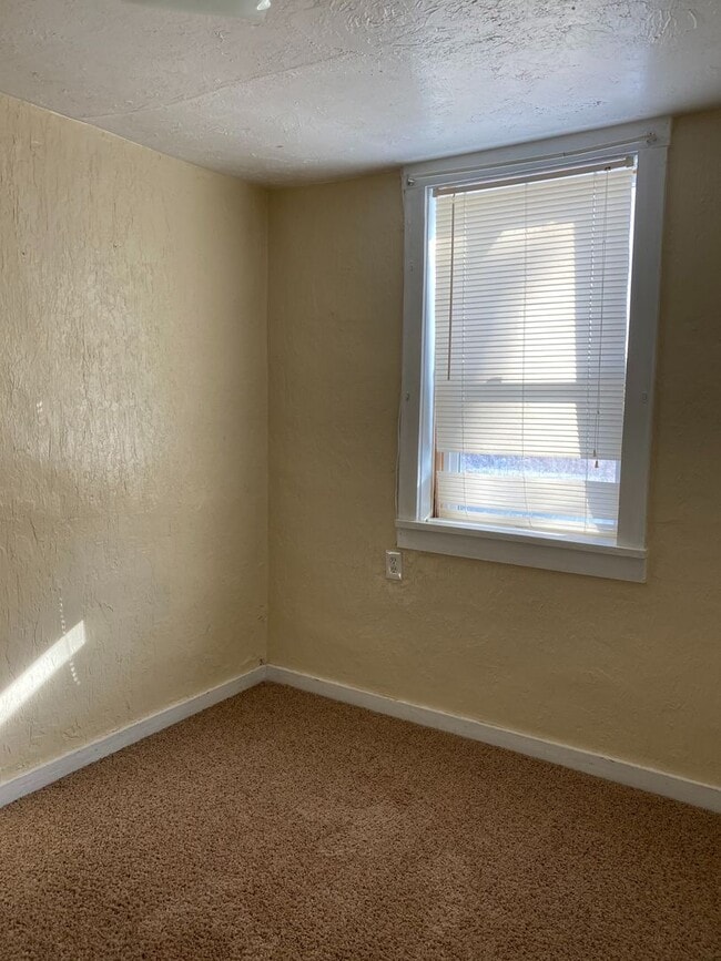 Building Photo - Cozy 2-Bedroom Home with Spacious Yard – C...