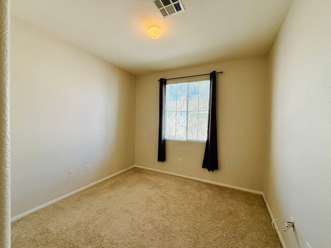 Building Photo - Immaculate and Inviting Two-Story Condo in Lone Mountain Available! 1/2 OFF THE FIRST FULL MONTH'...