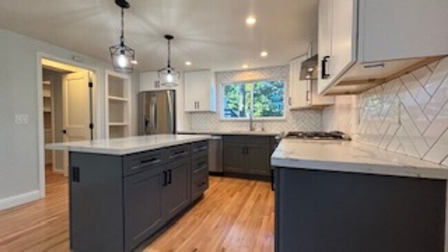 Building Photo - Stunning Tree-House Living with Beach Acce...