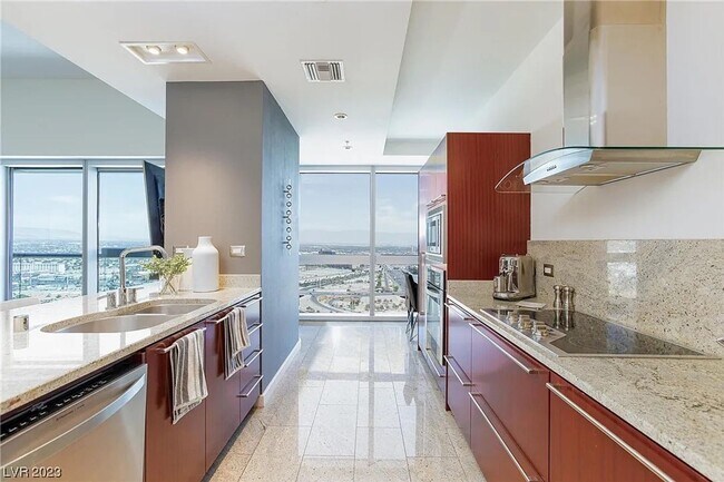 Building Photo - Gorgeous and Fully Furnished Penthouse Style Condo at The Martin