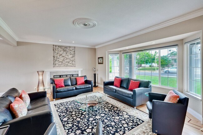 Building Photo - Remodeled 5 Bedroom Home with Heated Pool, Hillside Views, Solar, and Sunrise and Sunset Views in...
