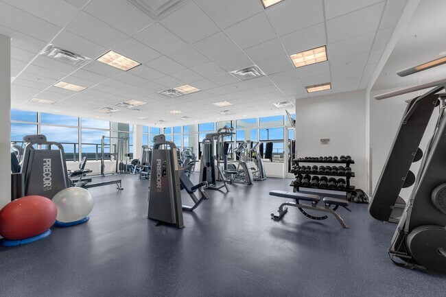 Building Photo - “Sleek Design Meets Walkable Downtown Livi...