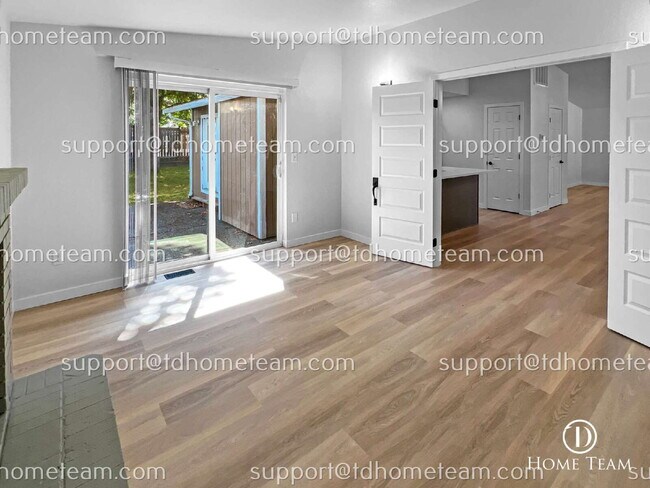 Building Photo - "Charming 3-Bedroom Retreat with Cozy Fire...