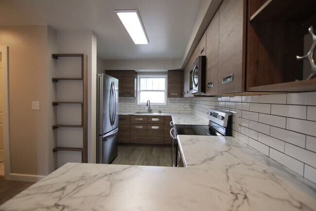 Building Photo - 1128 E 29th Ave