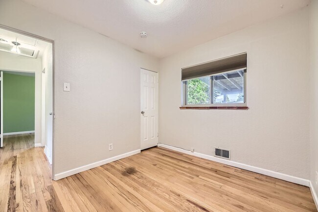 Building Photo - Spacious Home w/Large Backyard Only Blocks...