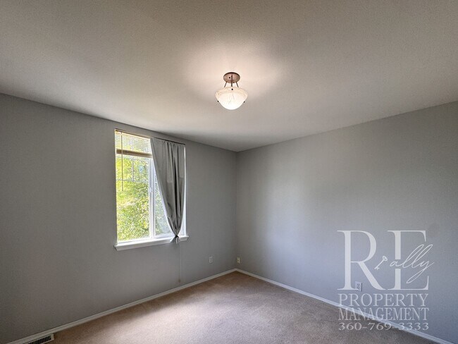 Building Photo - Dual Primary Suites, Huge Backyard Deck & Sun-Filled Living Spaces Near Everyday Conveniences