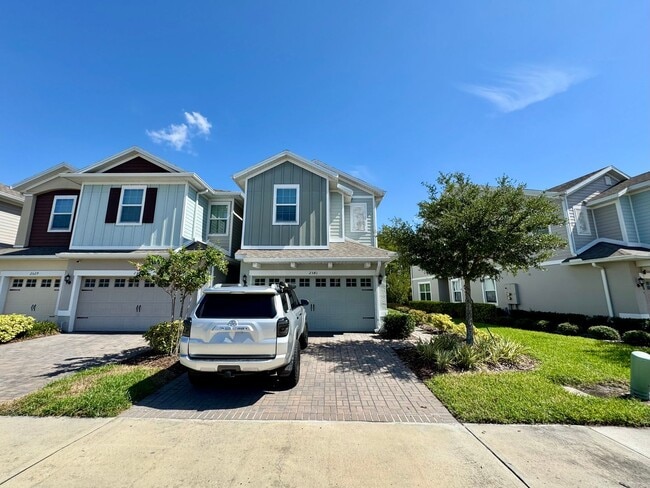 Building Photo - Beautiful End Unit Townhome Near Lake Nona w/ 2-Car Garage & Conservation Views!