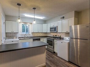 Building Photo - Cozy winter living in Midtown—plus big savings and waived fees—won’t last long!