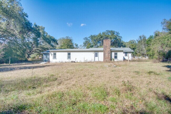 Building Photo - Stunning 4BR/2BA Pensacola Home with Private Pool, Modern Kitchen, Luxury Vinyl Flooring, Fully F...