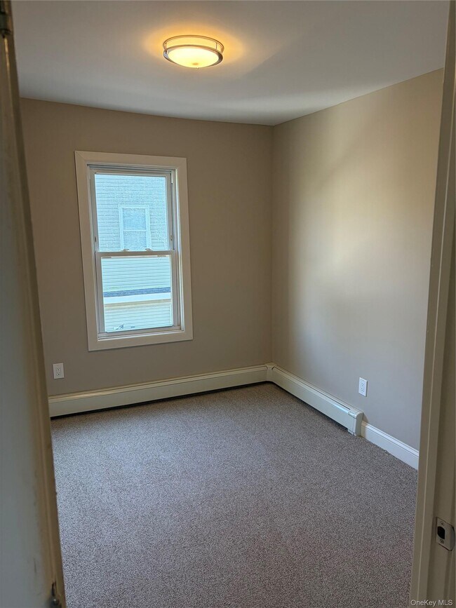 Building Photo - 48 Penataquit Ave
