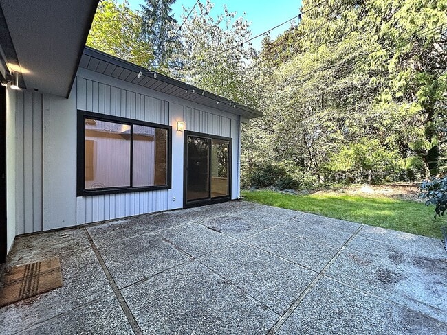 Building Photo - Gorgeous mid century modern home featuring...