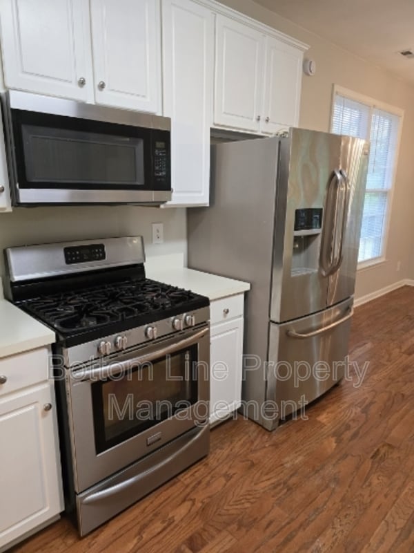 Building Photo - 7803 Harrington Woods Rd