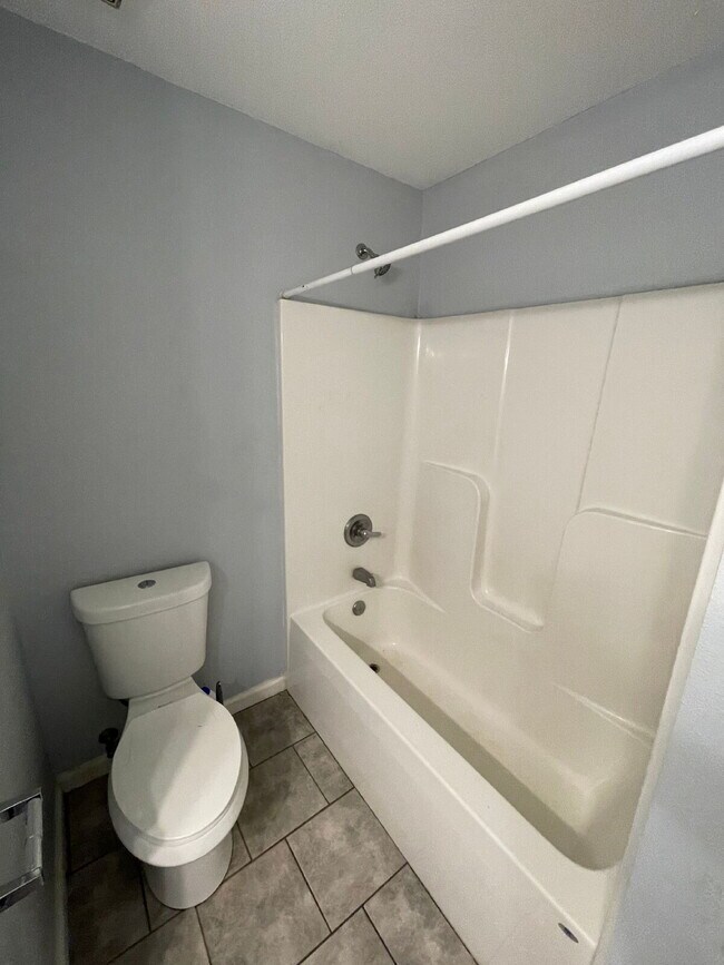 Building Photo - Open floor plan, four-bedroom two-bathroom with washer and dryer