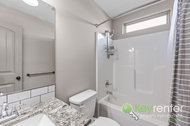 Building Photo - Spacious 4-Bedroom Home with Finished Basement & 3-Car Garage – Derby, KS