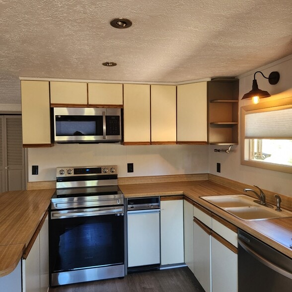 Building Photo - 1409 Old Wagon Rd